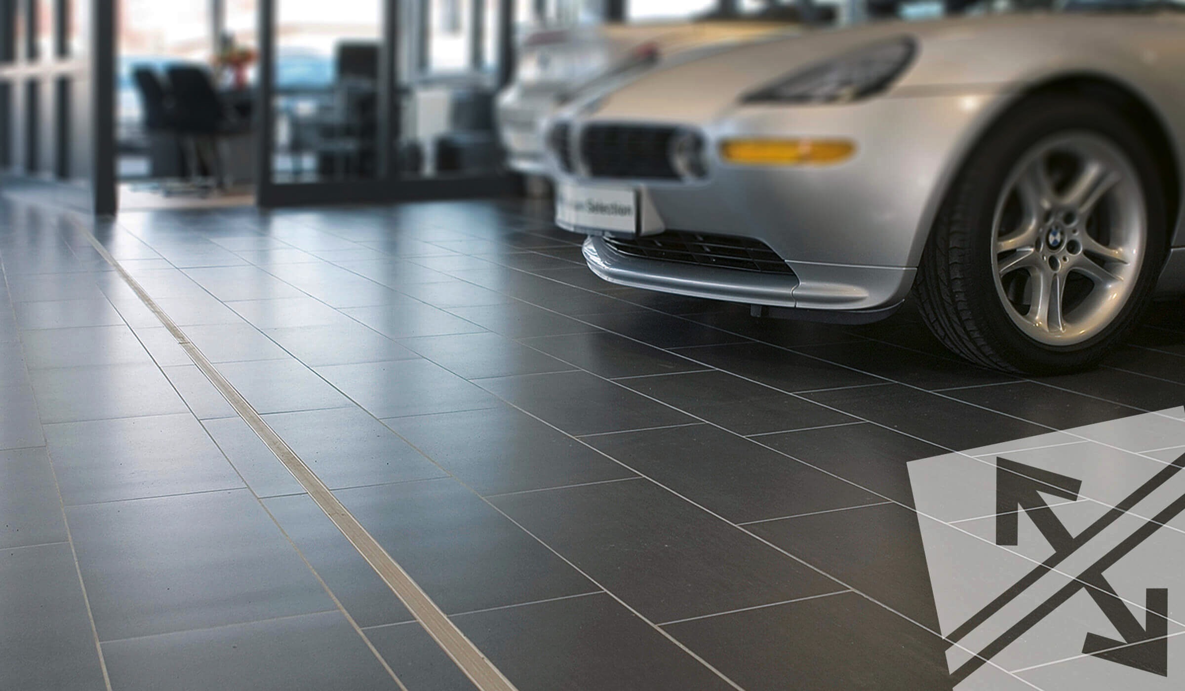 Dural coloured movement joints in car showroom
